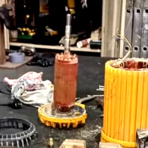 The middle section of Davey's TotalFlo water pump that was taken apart for auditing reasons. A long shaft can be seen where impellers are attached. On the rear end is the mechanical seal and backplate that helps to maintain the parts in place, as well as to protect the engine from being drenched by the water flow.