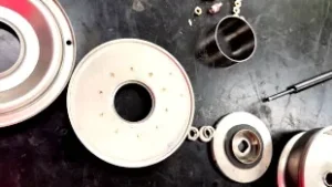 Both the mechanical seal and backplate found as individual components in close-up view. This was achieved after dismantling Davey's Garden System water pump for technical observation.