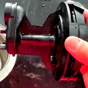 A close-up view of the black coloured Venturi tube that's made in glass-filled thermoplastic. This is a core component of Davey's Garden System pump that helps to increase pressure and velocity, while simultaneously reducing volumetric flow rate.