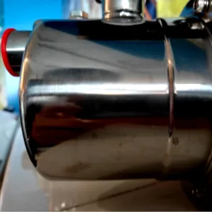 An overview of Davey's Garden System water pump's volute casing. Reflection of light can be glimpsed to show its polished stainless steel production quality.