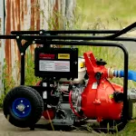 A water pump with a handle, as well as miniature wheels fastened to show this centrifugal pump is built for the convenience of the outdoors.